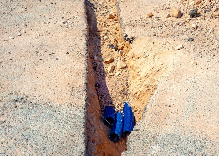 Digging,A,Restricted,Section,For,Buried,Corrugated,Plastic,Conduits,To